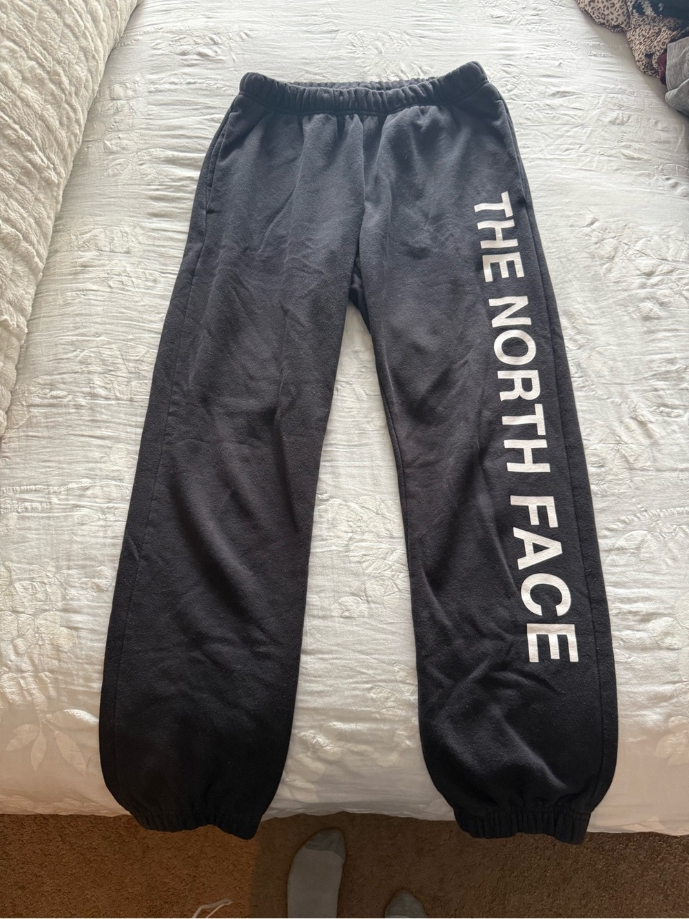 The North Face Black Sweatpants with White Side Logo